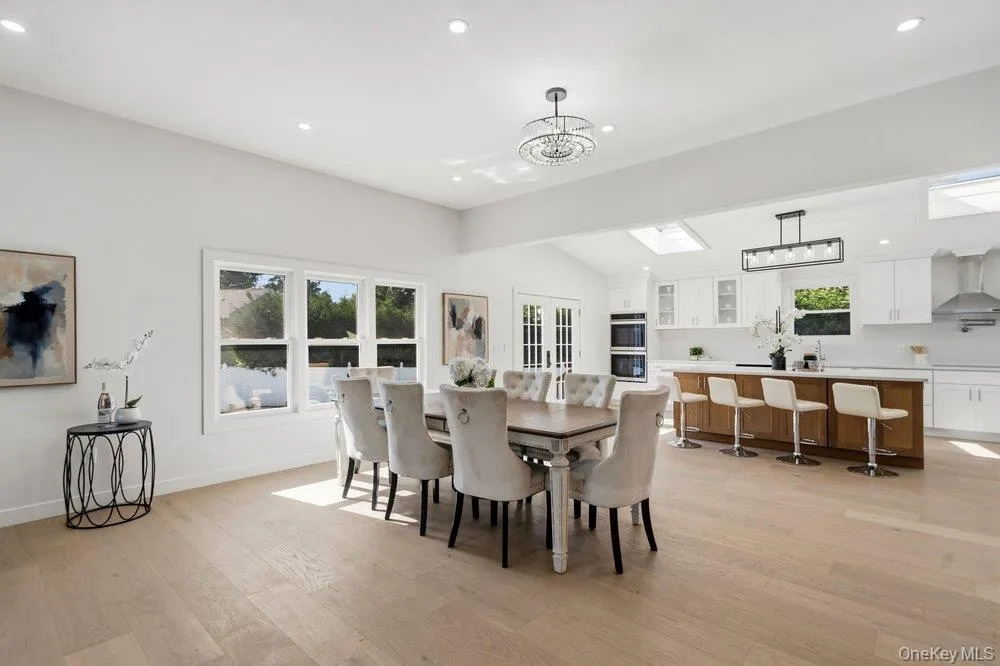 Dining Room Overlooks The IG Pool and has Entrance into the Backyard Dining Room Overlooks The IG Pool and has Entrance into the Backyard