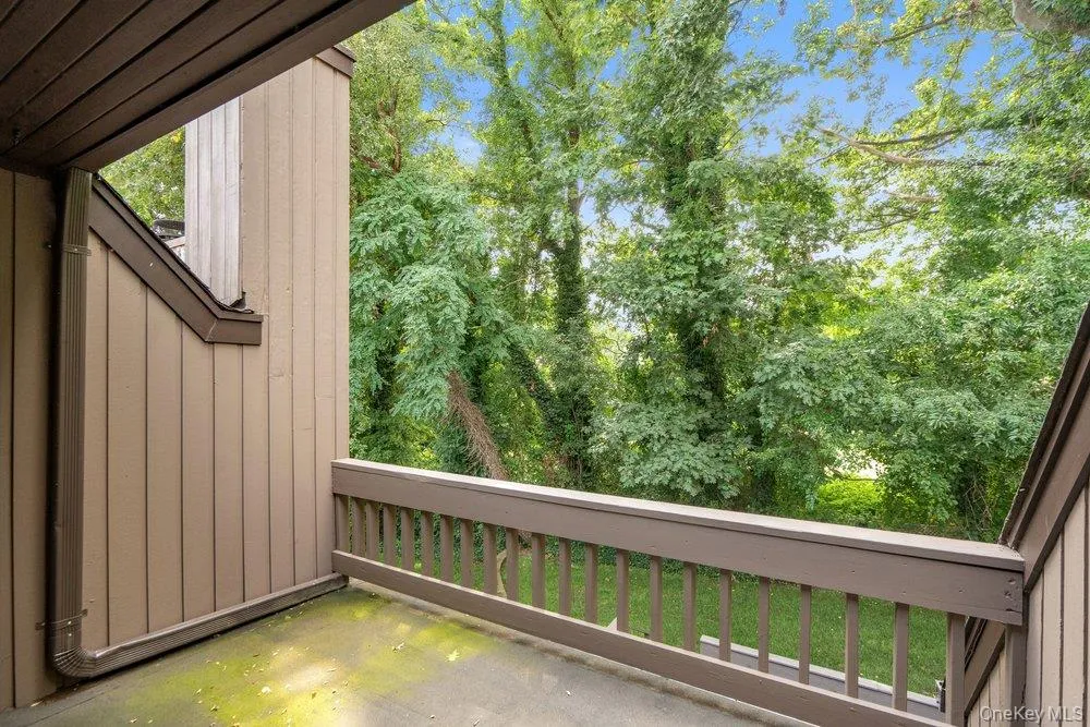 Balcony off Primary Suite overlooking a golf course Balcony off Primary Suite overlooking a golf course
