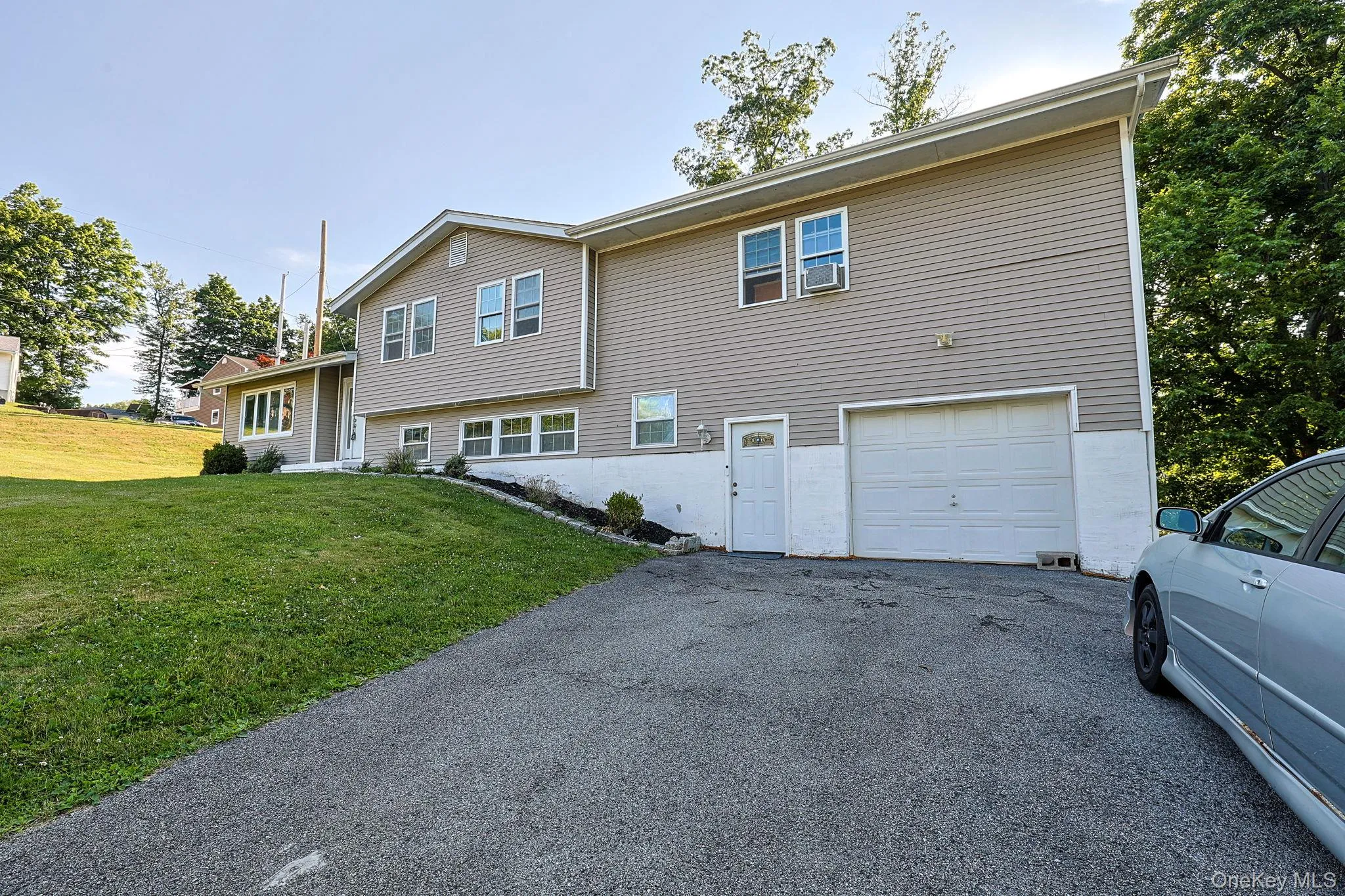 Large driveway and one car garage Large driveway and one car garage