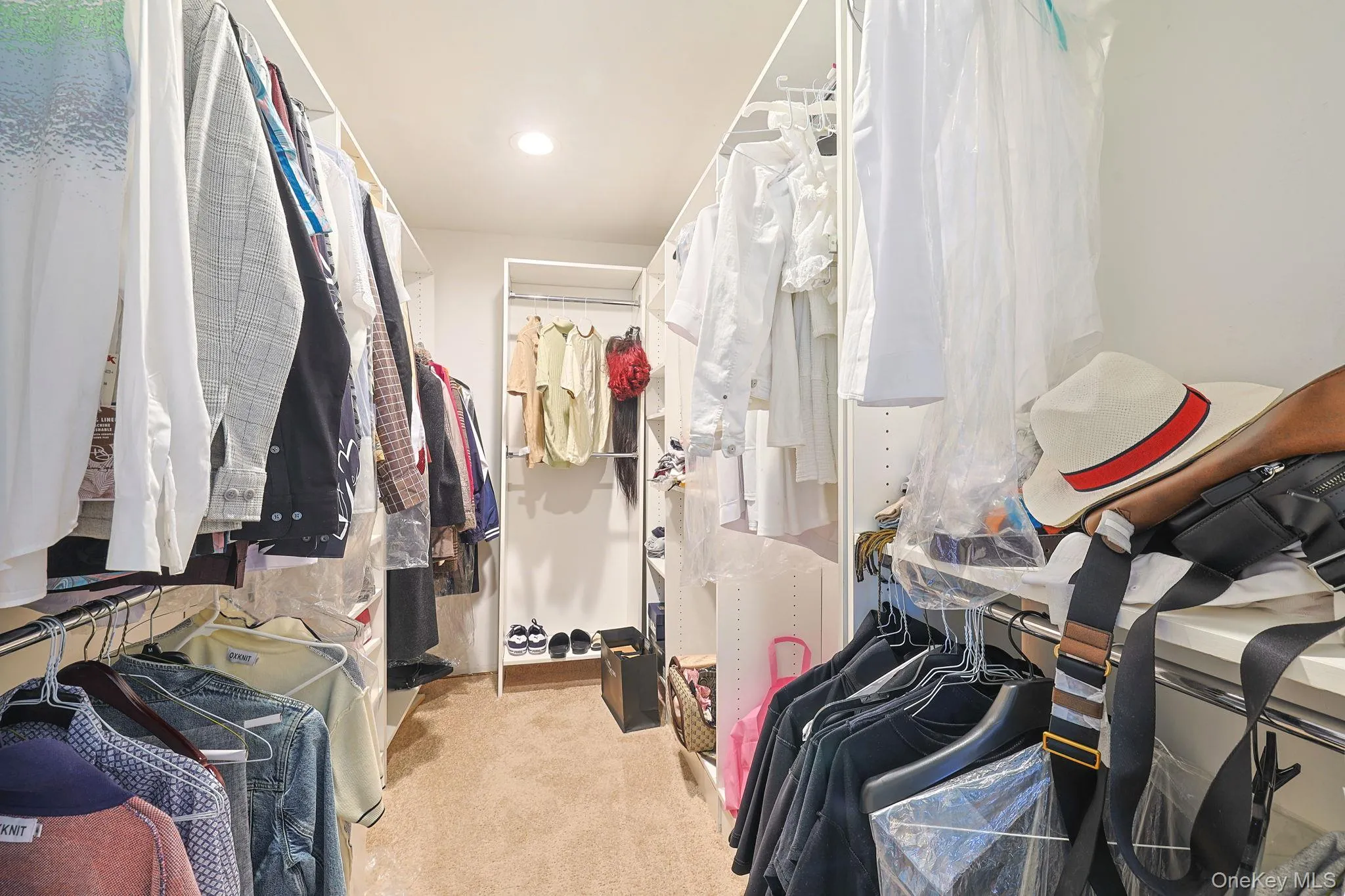 Large walk-in closet Large walk-in closet