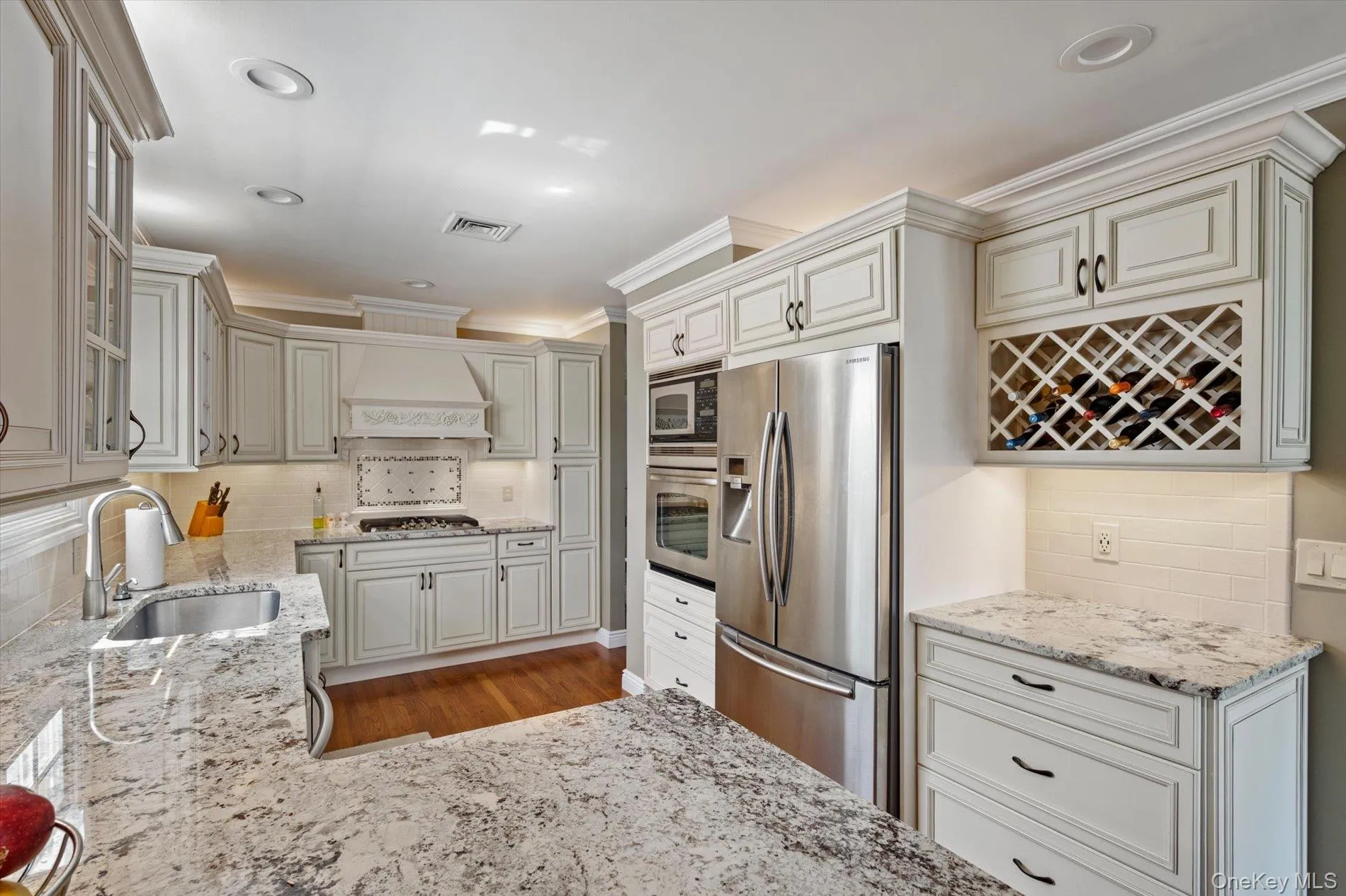 Kitchen with Top Shelf Stainless Steel Appliances and Wine rack Kitchen with Top Shelf Stainless Steel Appliances and Wine rack