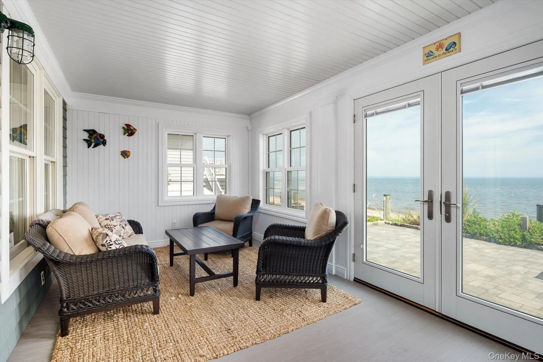 Sunroom with 180 degrees of Waterfront Views Sunroom with 180 degrees of Waterfront Views