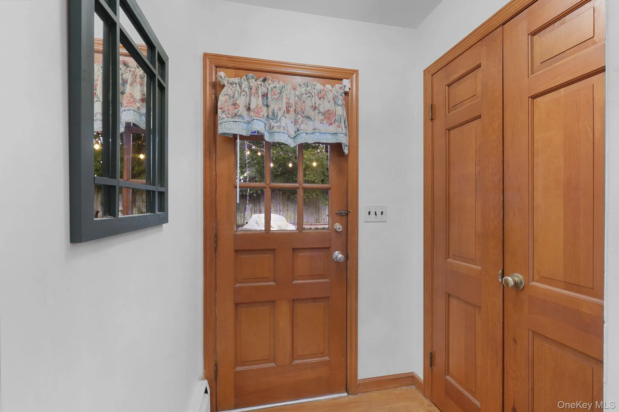 Door to Back Deck, with Coat Closet Door to Back Deck, with Coat Closet