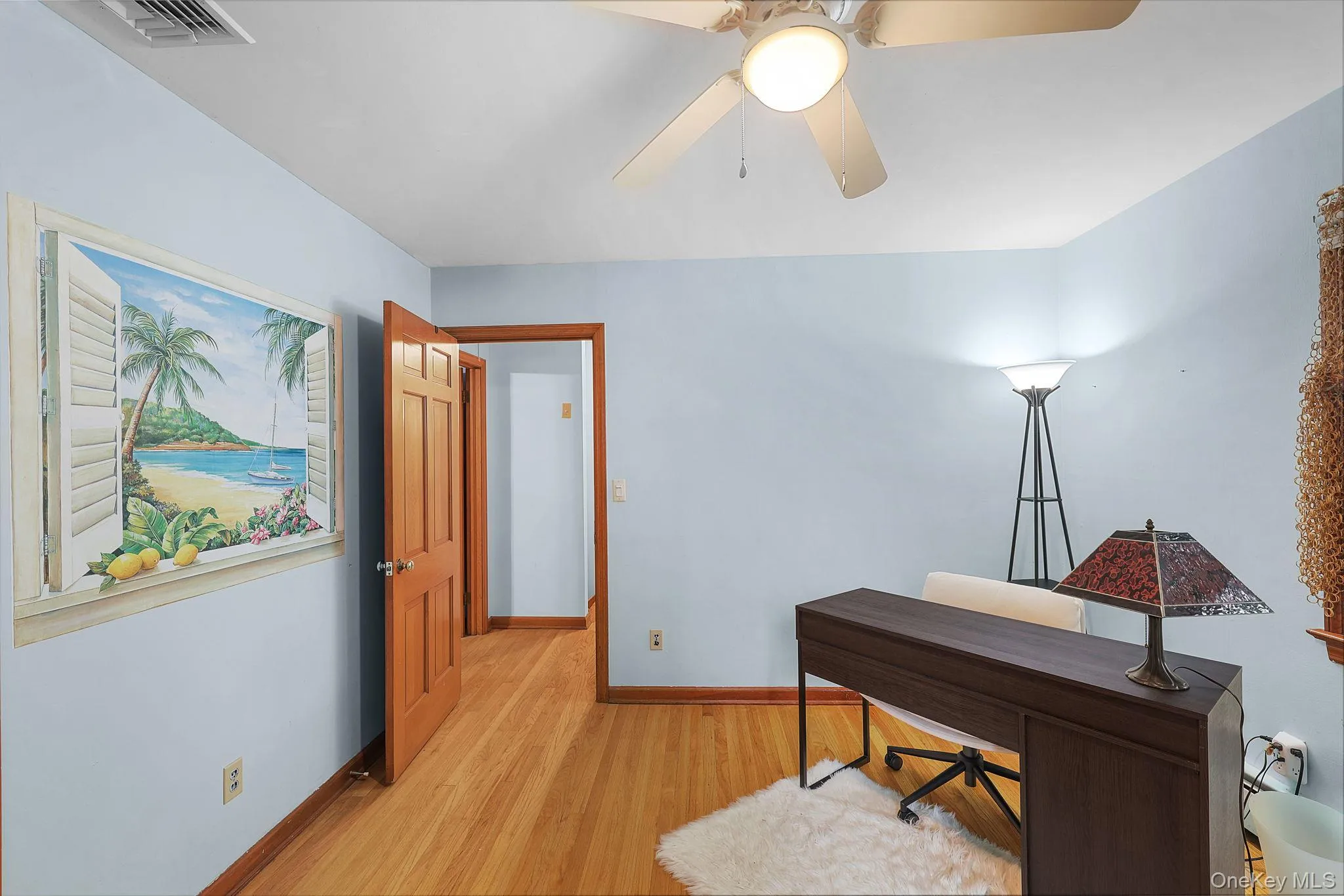 Third Bedroom with Hardwood Floors, Ceiling Fan and Double Closets Third Bedroom with Hardwood Floors, Ceiling Fan and Double Closets