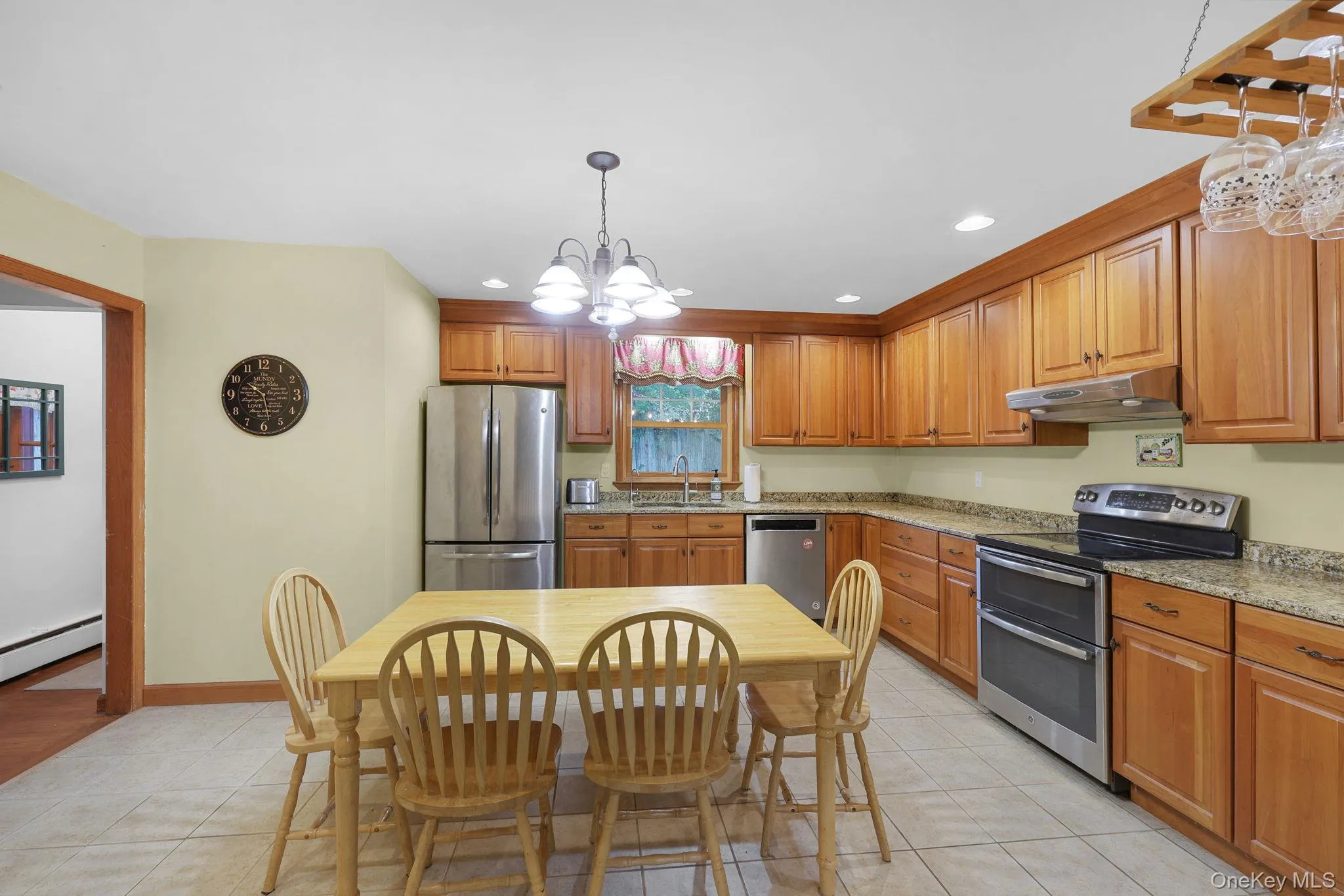 Spacious Eat In Kitchen with Granite Countertop, Stainless Steel Appliances Spacious Eat In Kitchen with Granite Countertop, Stainless Steel Appliances