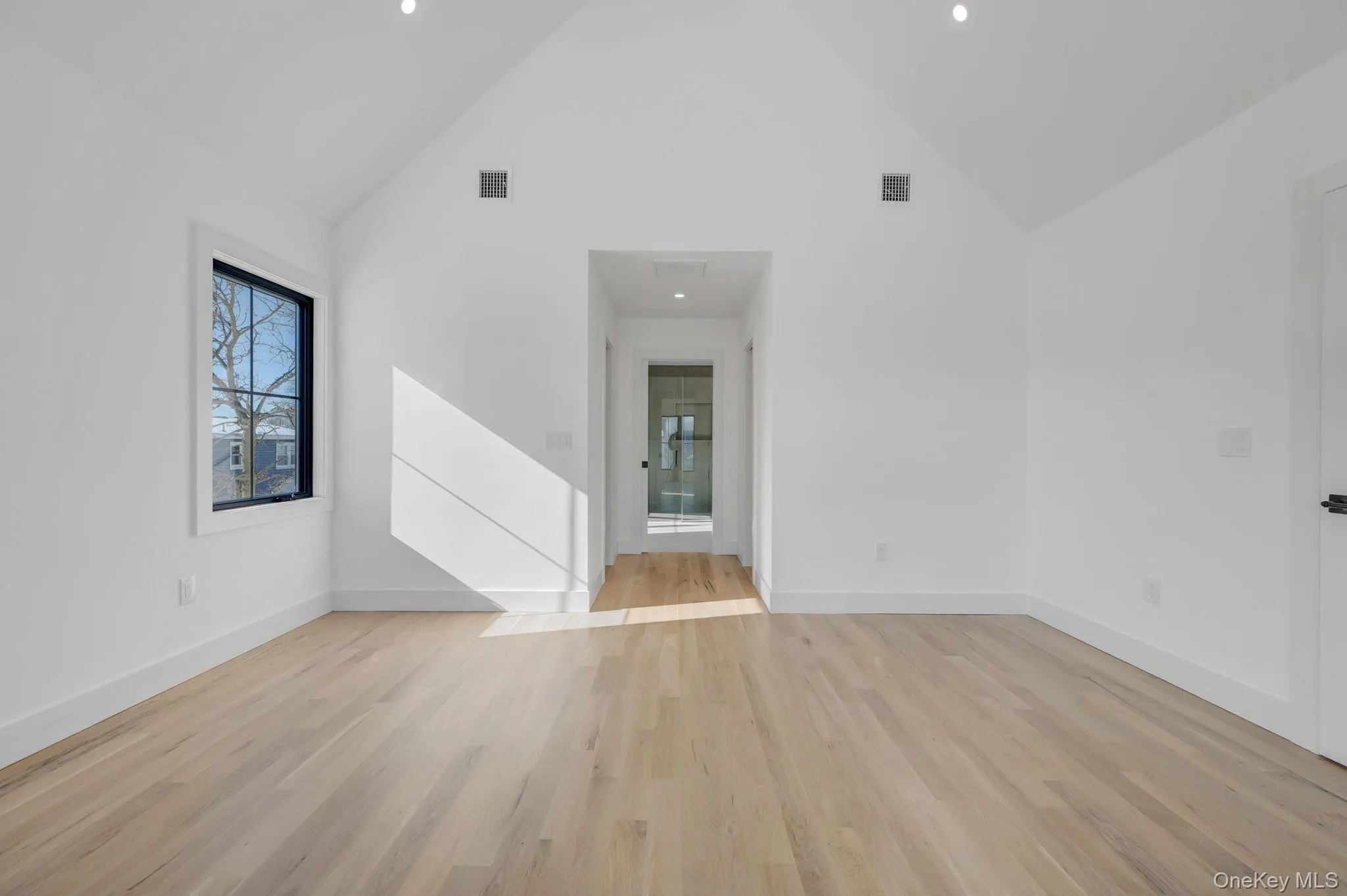 Spacious retreat with vaulted ceilings and large windows, dual walk in closets and primary bath. Spacious retreat with vaulted ceilings and large windows, dual walk in closets and primary bath.