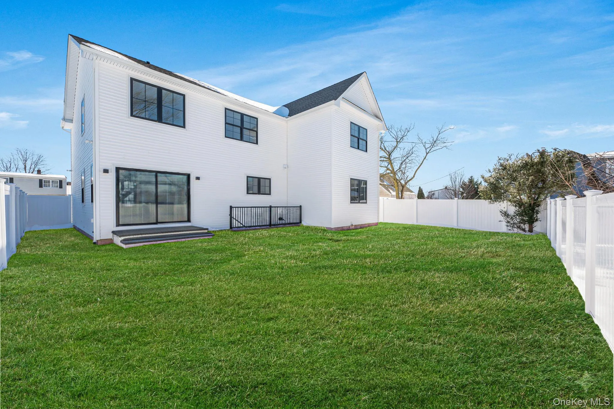 Level backyard space accessible from the main living area, providing room for outdoor enjoyment and entertaining. Level backyard space accessible from the main living area, providing room for outdoor enjoyment and entertaining.