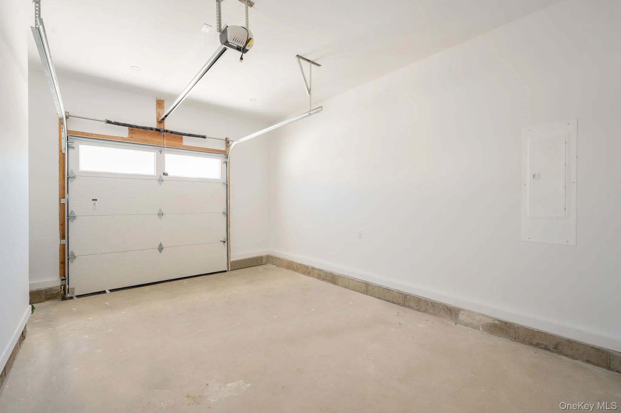 One car garage with entry into mud room. One car garage with entry into mud room.