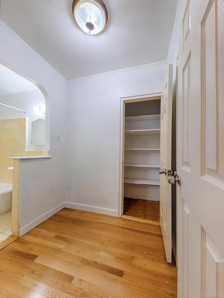 Showing one of the two closets in dressing/office area Showing one of the two closets in dressing/office area