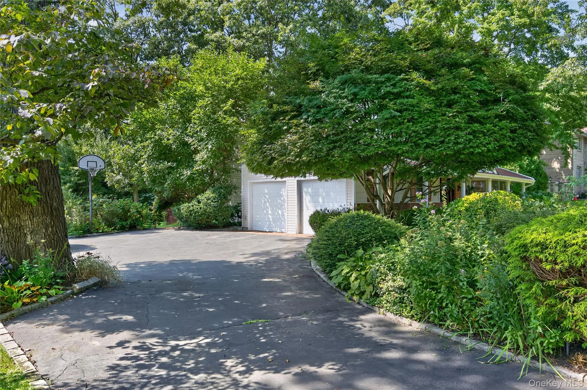Large driveway, with outdoor EV charger (2nd EV charger in garage) Large driveway, with outdoor EV charger (2nd EV charger in garage)