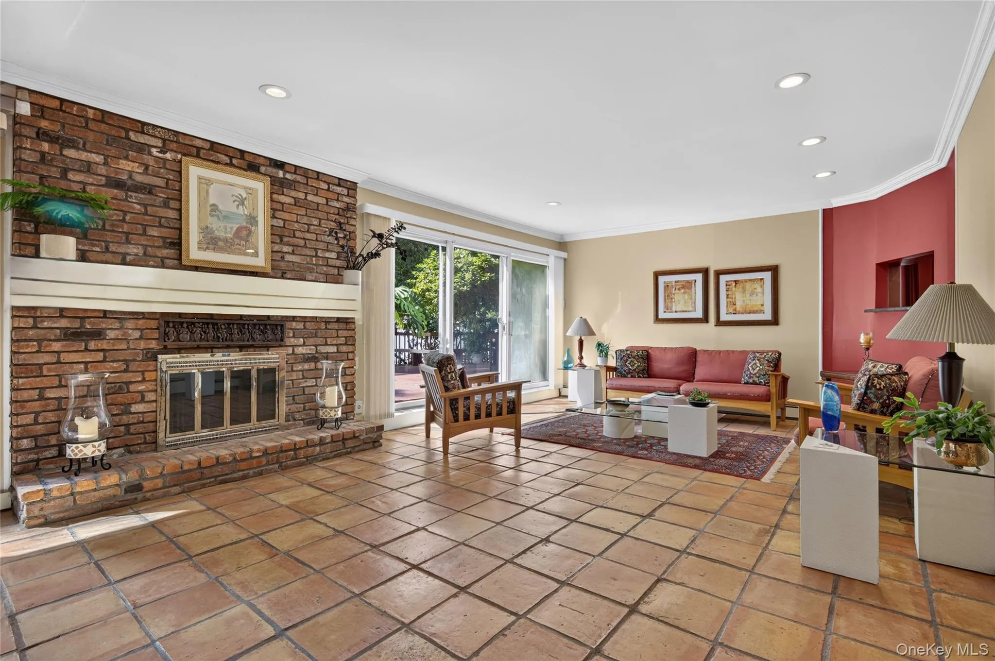 Living Room with shared Fireplace and sliders to the deck Living Room with shared Fireplace and sliders to the deck