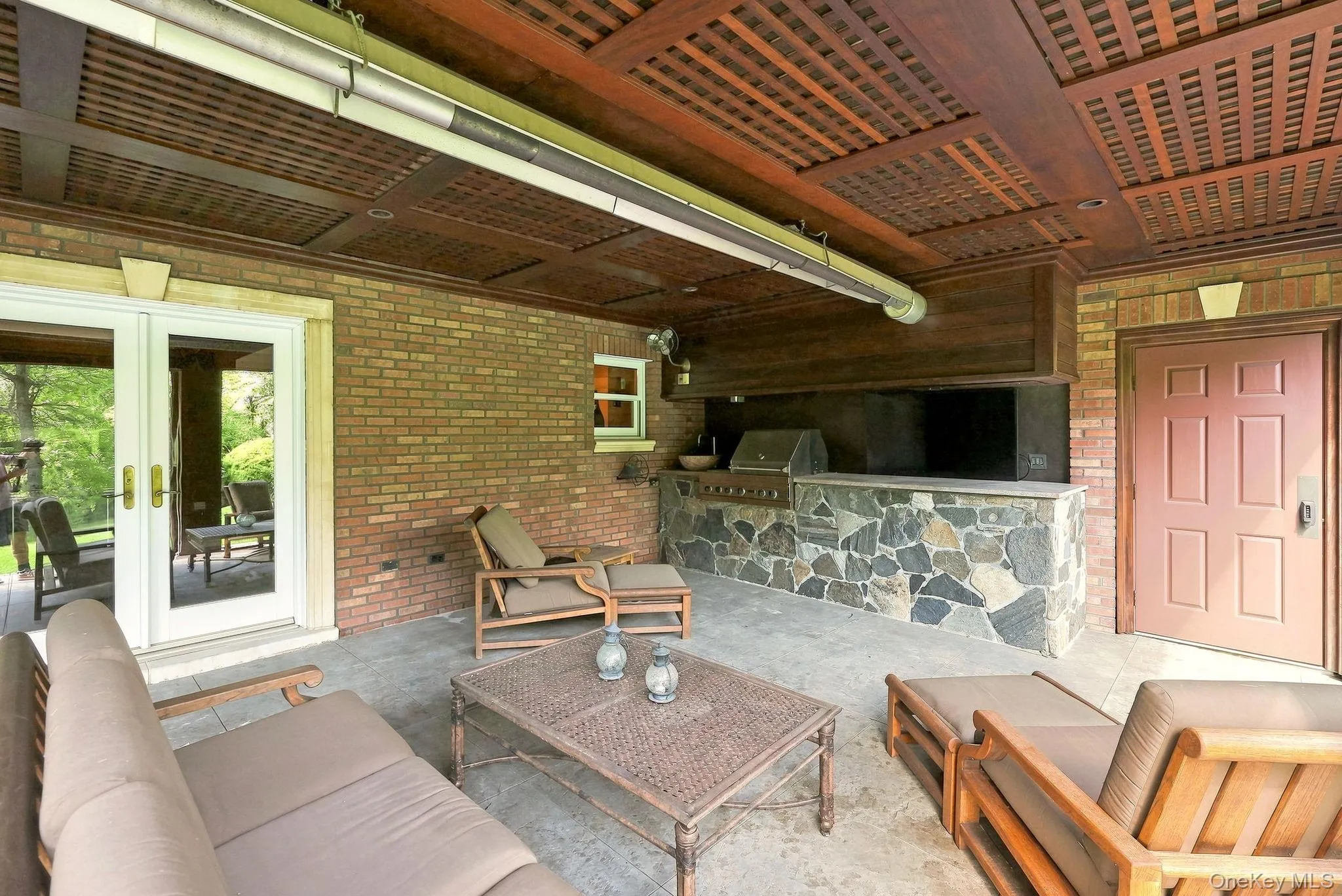 A heated covered patio with motorized shades for privacy A heated covered patio with motorized shades for privacy