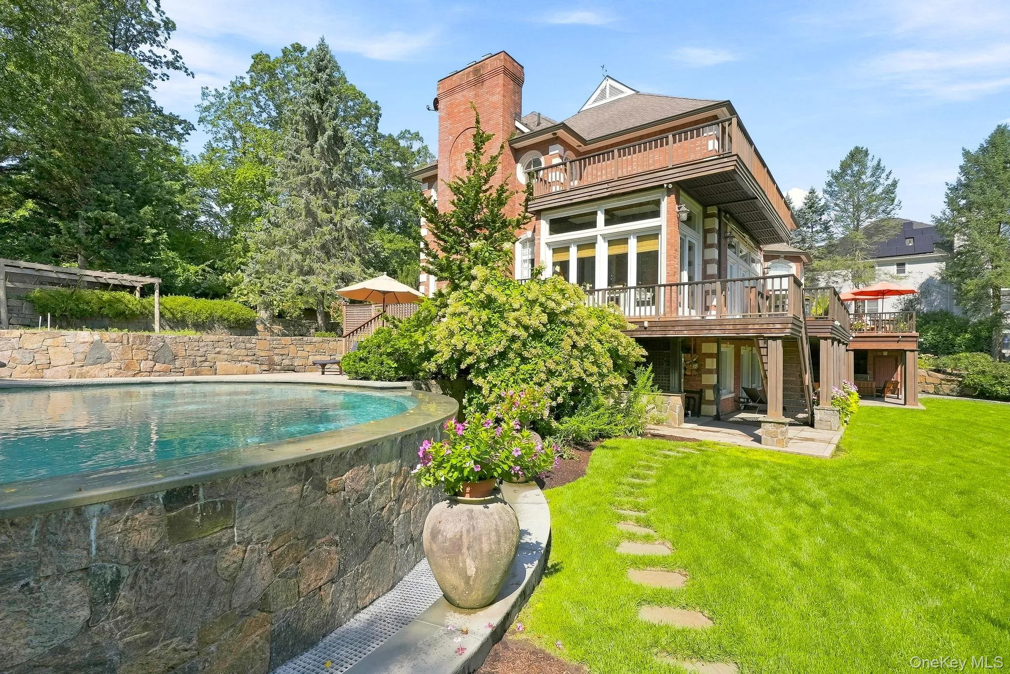 Heated vanishing edge pool with hot tub Heated vanishing edge pool with hot tub