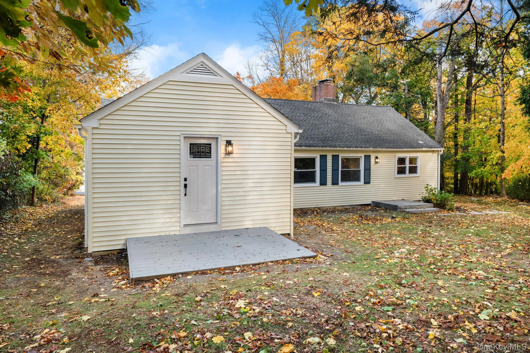 Convenient rear entry leads directly into the home, surrounded by a peaceful wooded backdrop ideal for privacy and relaxation. Convenient rear entry leads directly into the home, surrounded by a peaceful wooded backdrop ideal for privacy and relaxation.