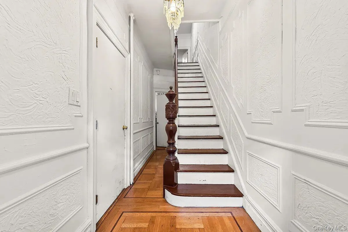 Staircase from first floor view. Staircase from first floor view.