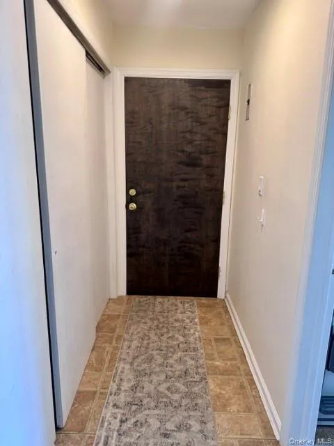 Private Entry Hall with wall of closets Private Entry Hall with wall of closets