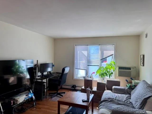 Bright and Open Living Room with Hardwood Floors Bright and Open Living Room with Hardwood Floors