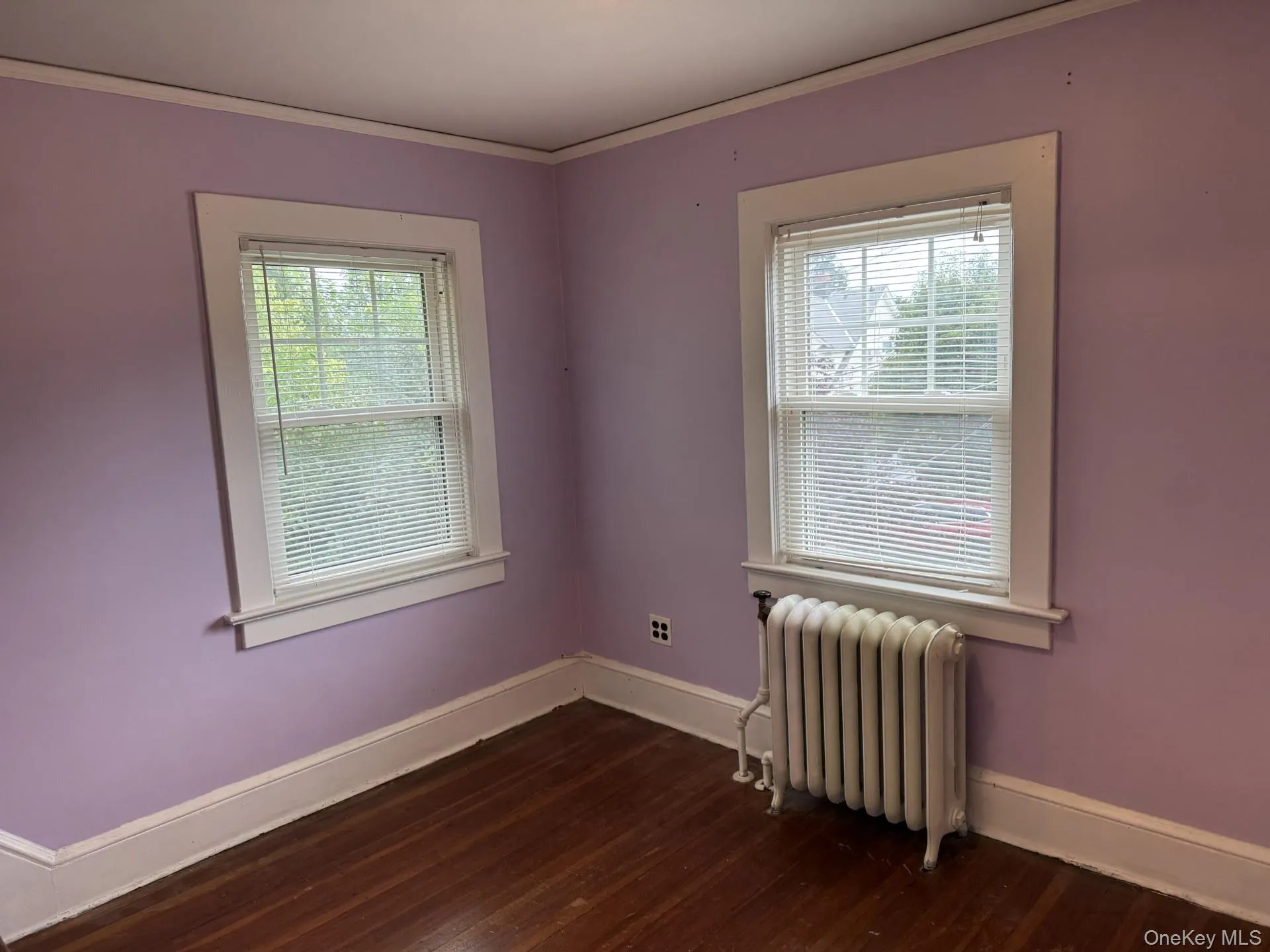 Bedroom with hardwood floors and facing East for the morning sun Bedroom with hardwood floors and facing East for the morning sun