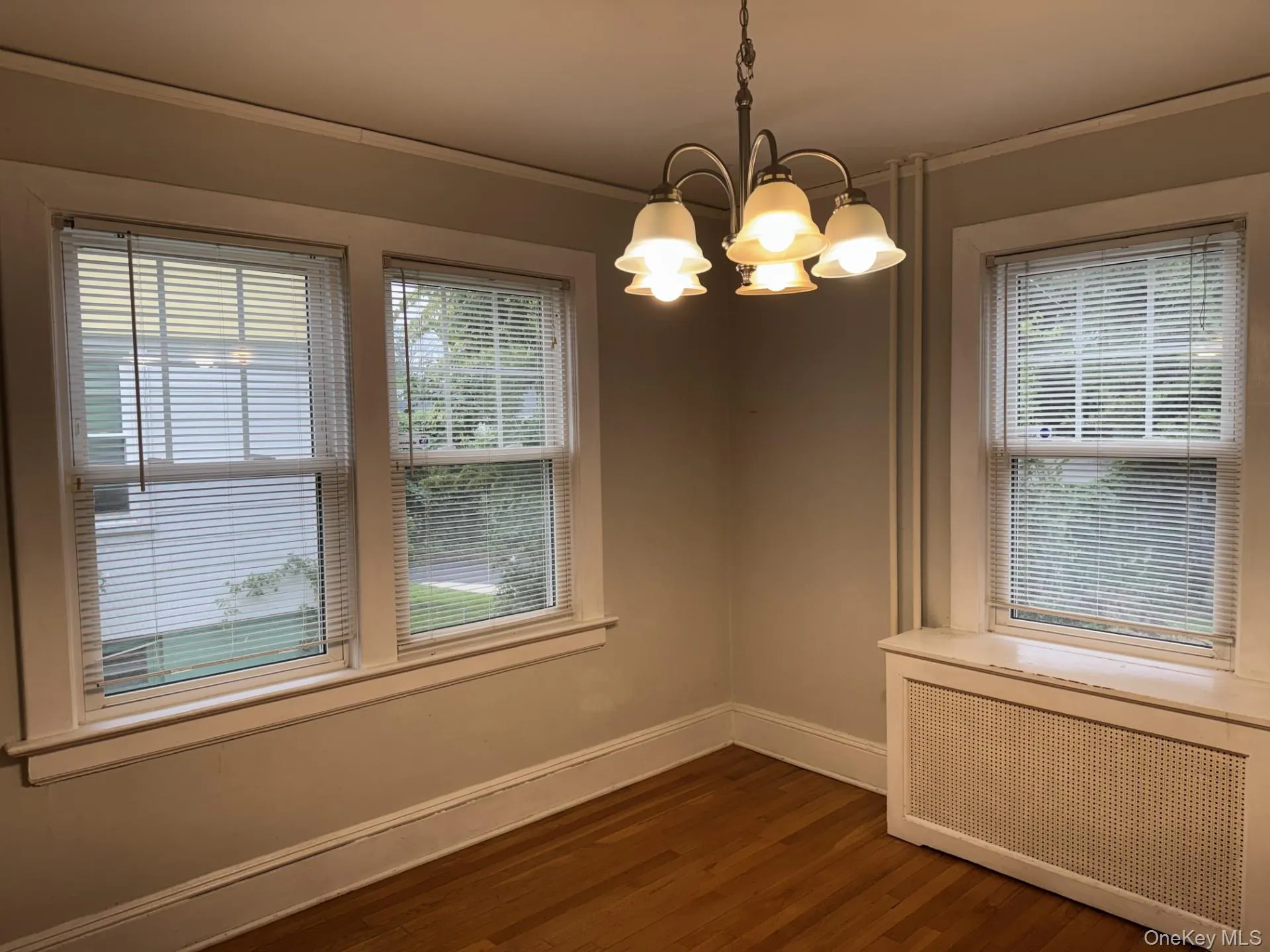 Great Dining room with hardwood flooring and facing the backyard Great Dining room with hardwood flooring and facing the backyard