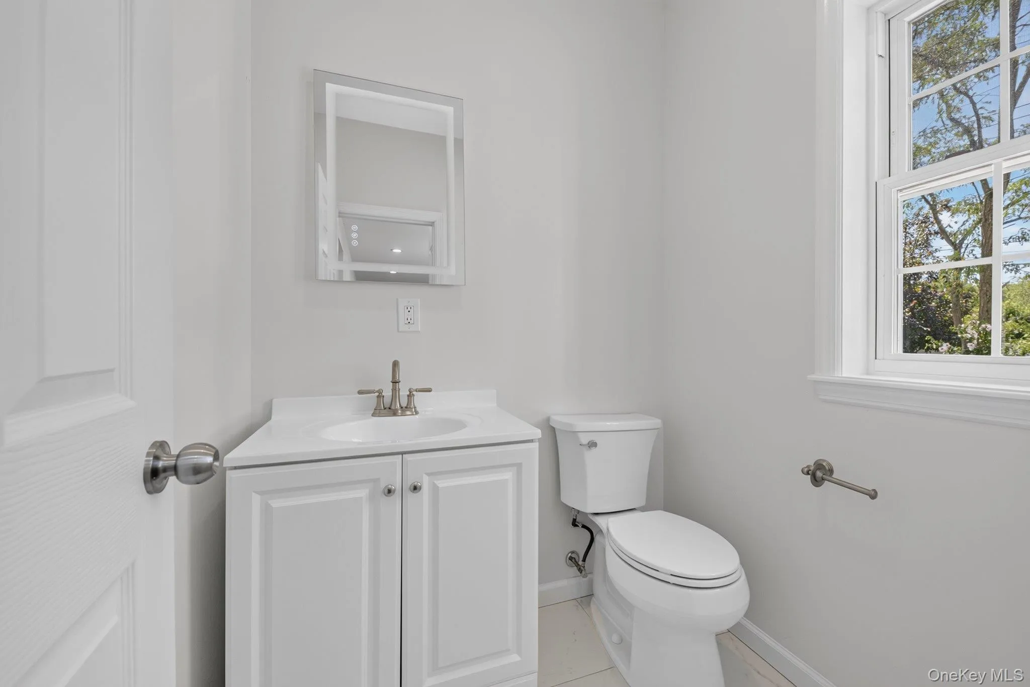 First floor half bathroom. First floor half bathroom.
