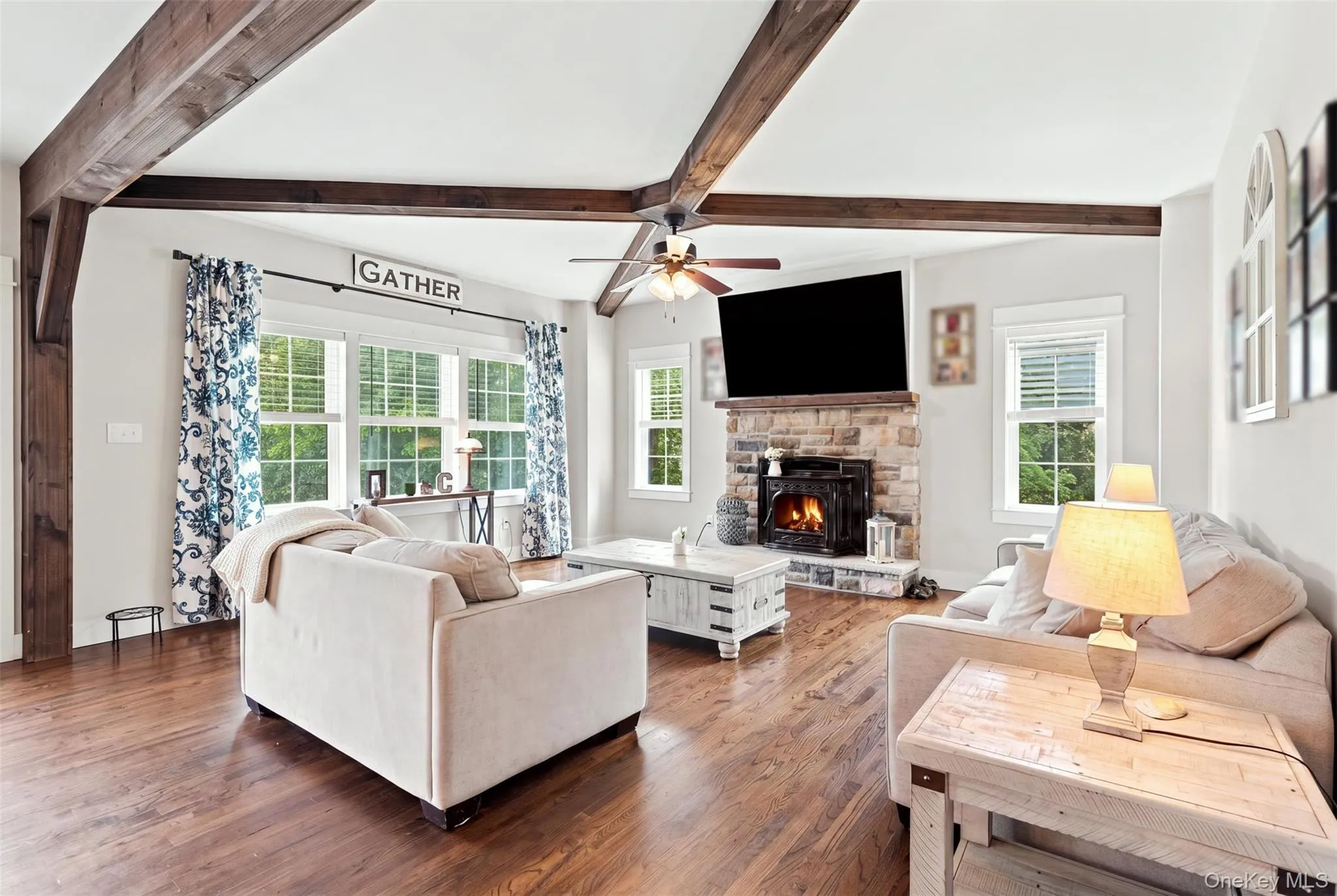 Warm and inviting living room with plenty of space for larger sectionals Warm and inviting living room with plenty of space for larger sectionals