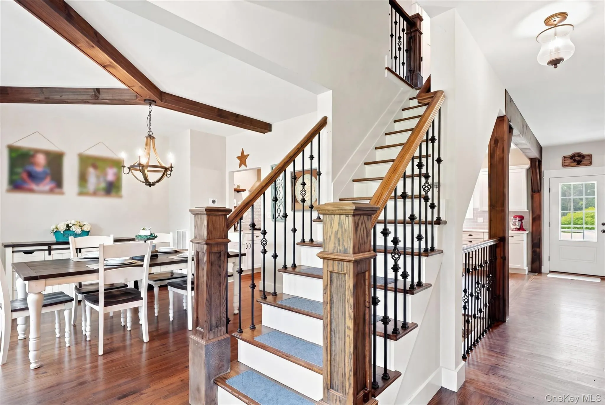 Open concept living with great flow from one living space to another. Rich hardwood floors and neutral walls. Open concept living with great flow from one living space to another. Rich hardwood floors and neutral walls.