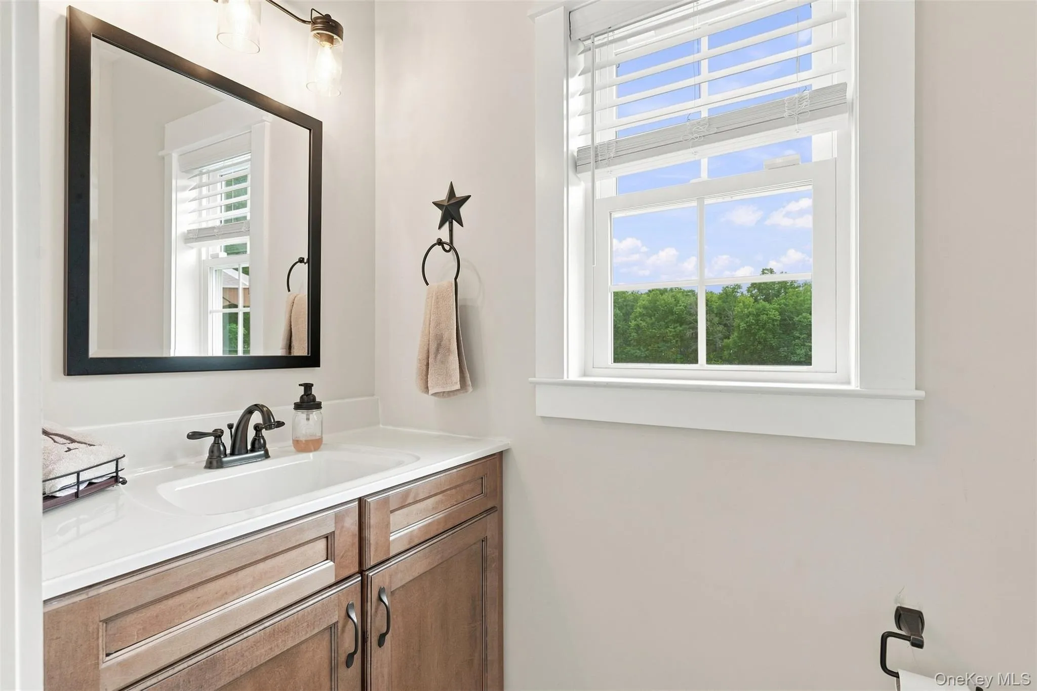Updated half bathroom in the backhall. Updated half bathroom in the backhall.