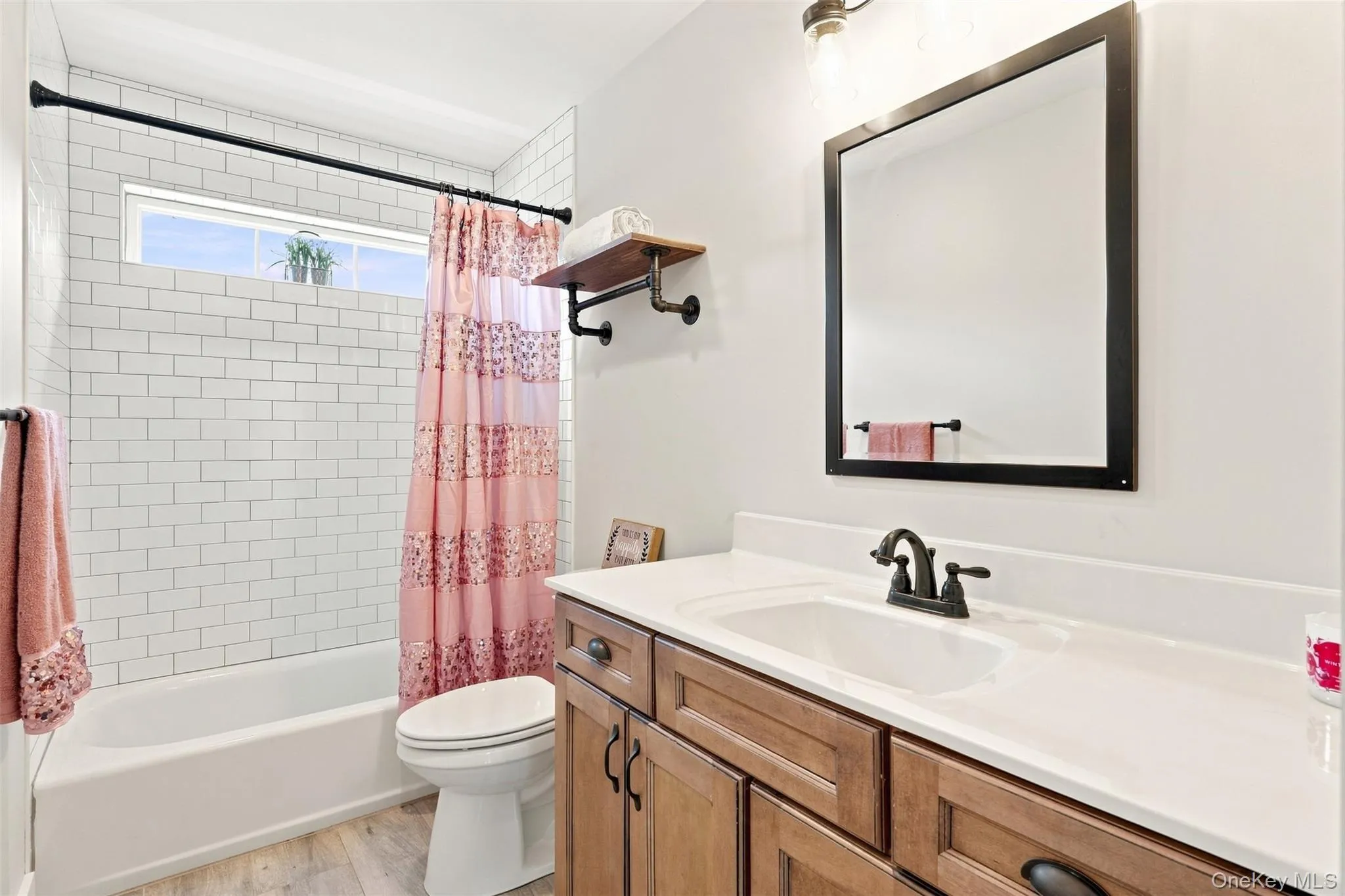 Shared full bathroom with bathtub/shower combo Shared full bathroom with bathtub/shower combo