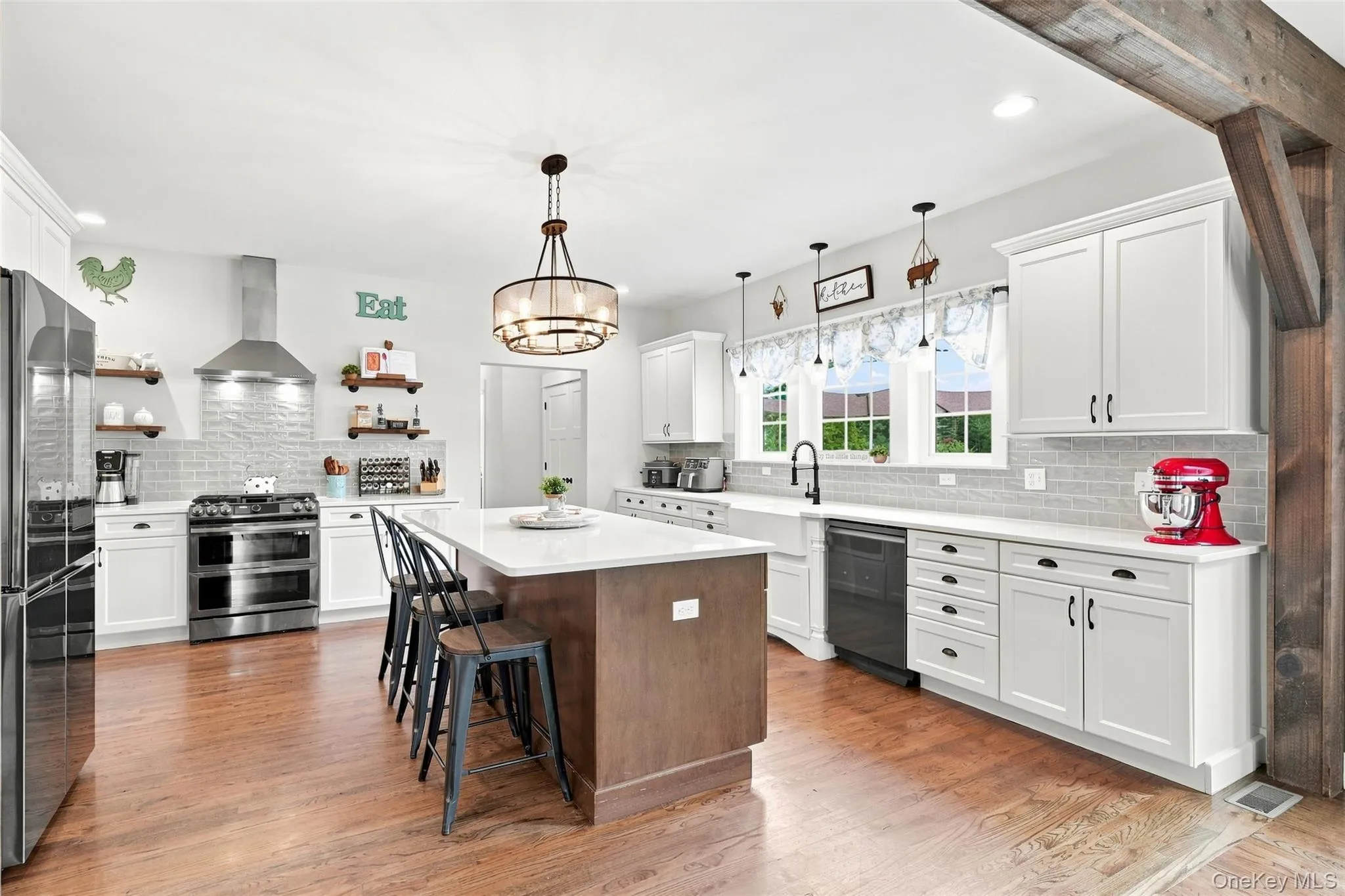 Abundant cabinet space, oversized island and gorgeous farmhouse details Abundant cabinet space, oversized island and gorgeous farmhouse details