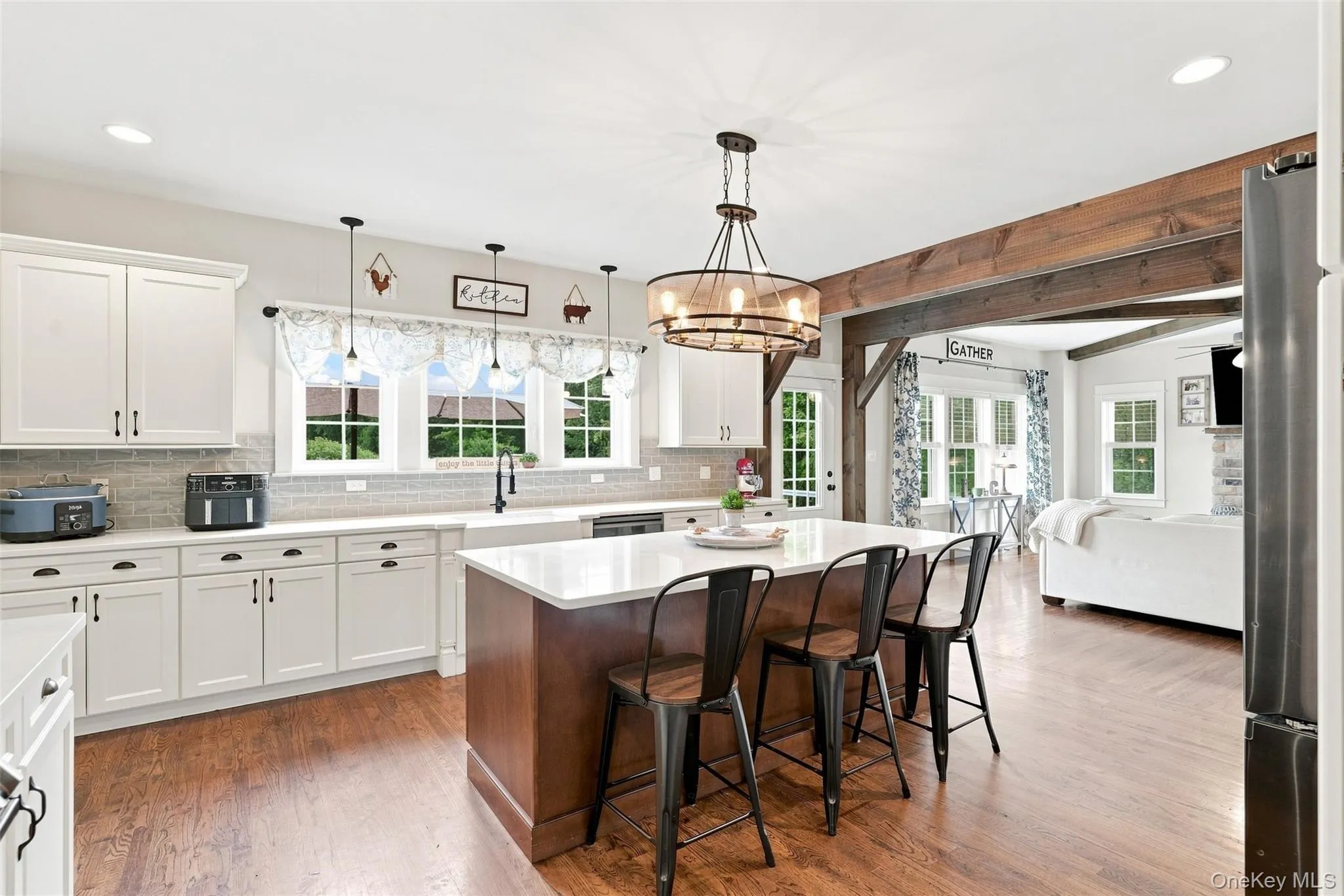Abundant cabinet space, oversized island and gorgeous farmhouse details Abundant cabinet space, oversized island and gorgeous farmhouse details