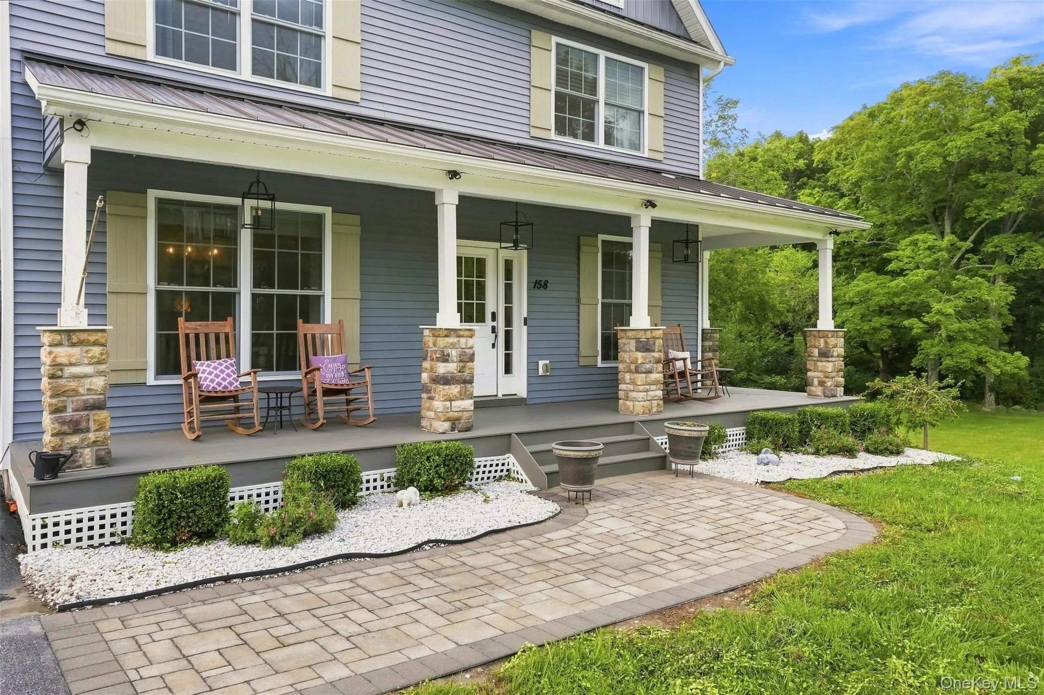 Classic rocking chair covered front porch, a home you will be proud to call your own Classic rocking chair covered front porch, a home you will be proud to call your own