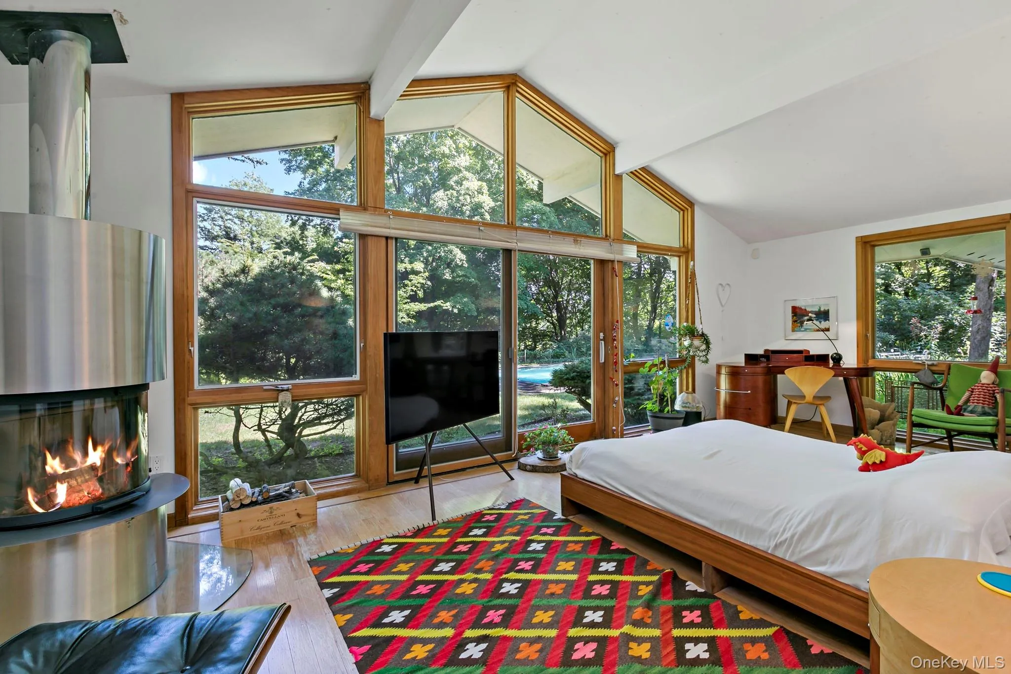 Primary bedroom overlooks the grounds. Primary bedroom overlooks the grounds.
