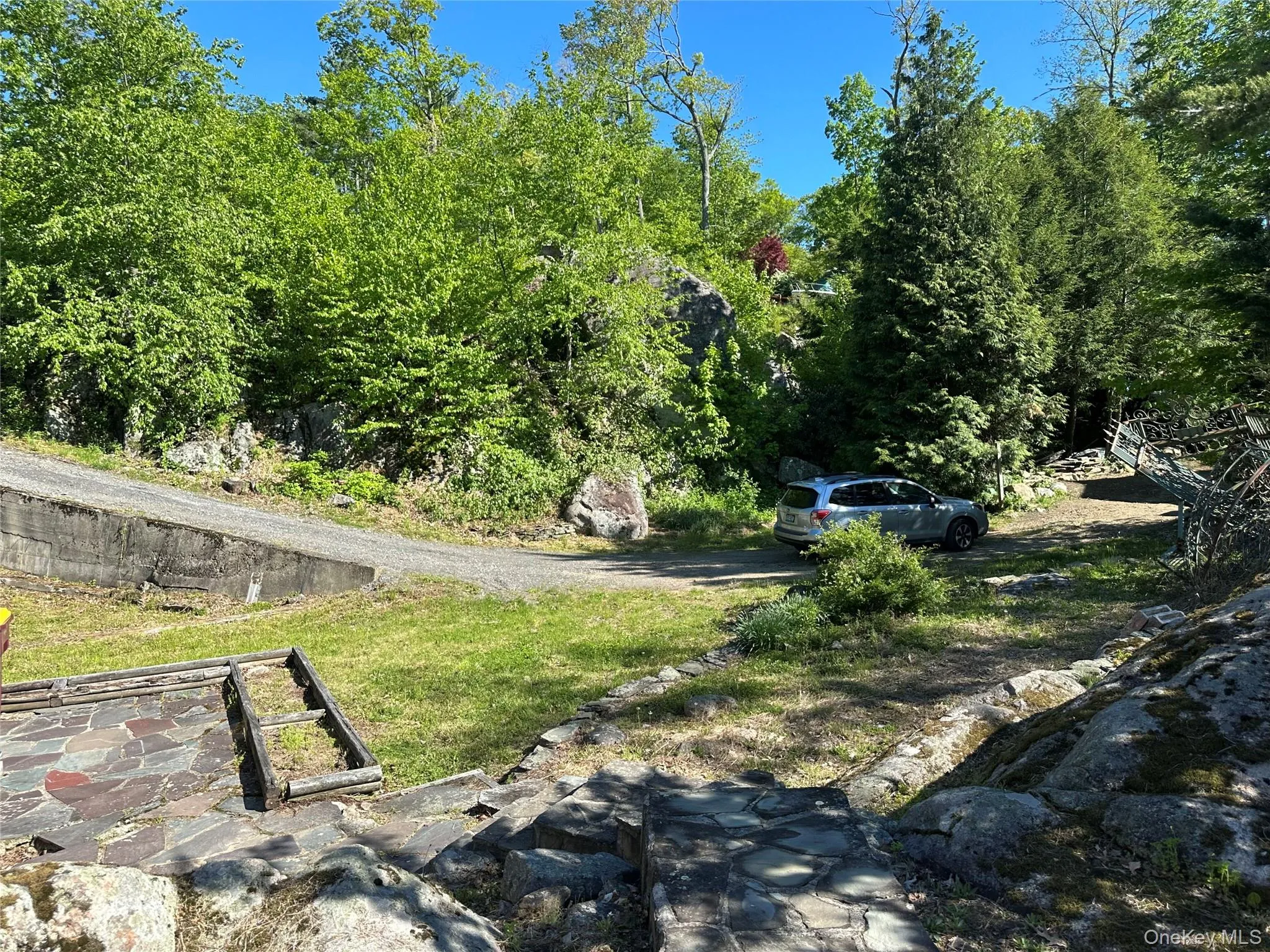 And there is a right-of-way driveway that provides an alternate access from behind the house... And there is a right-of-way driveway that provides an alternate access from behind the house...