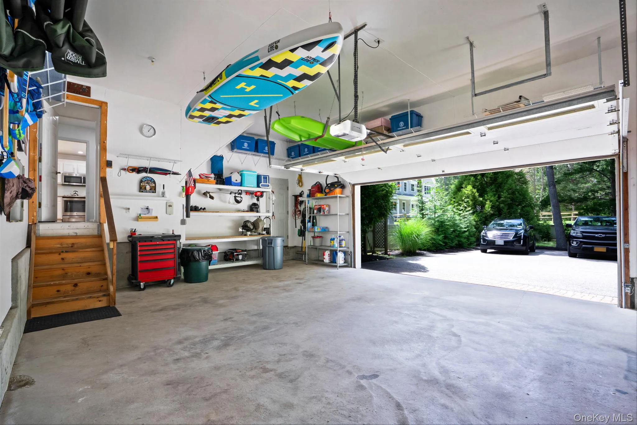 2.5 car garage with 12 foot ceilings and lots of storage space 2.5 car garage with 12 foot ceilings and lots of storage space