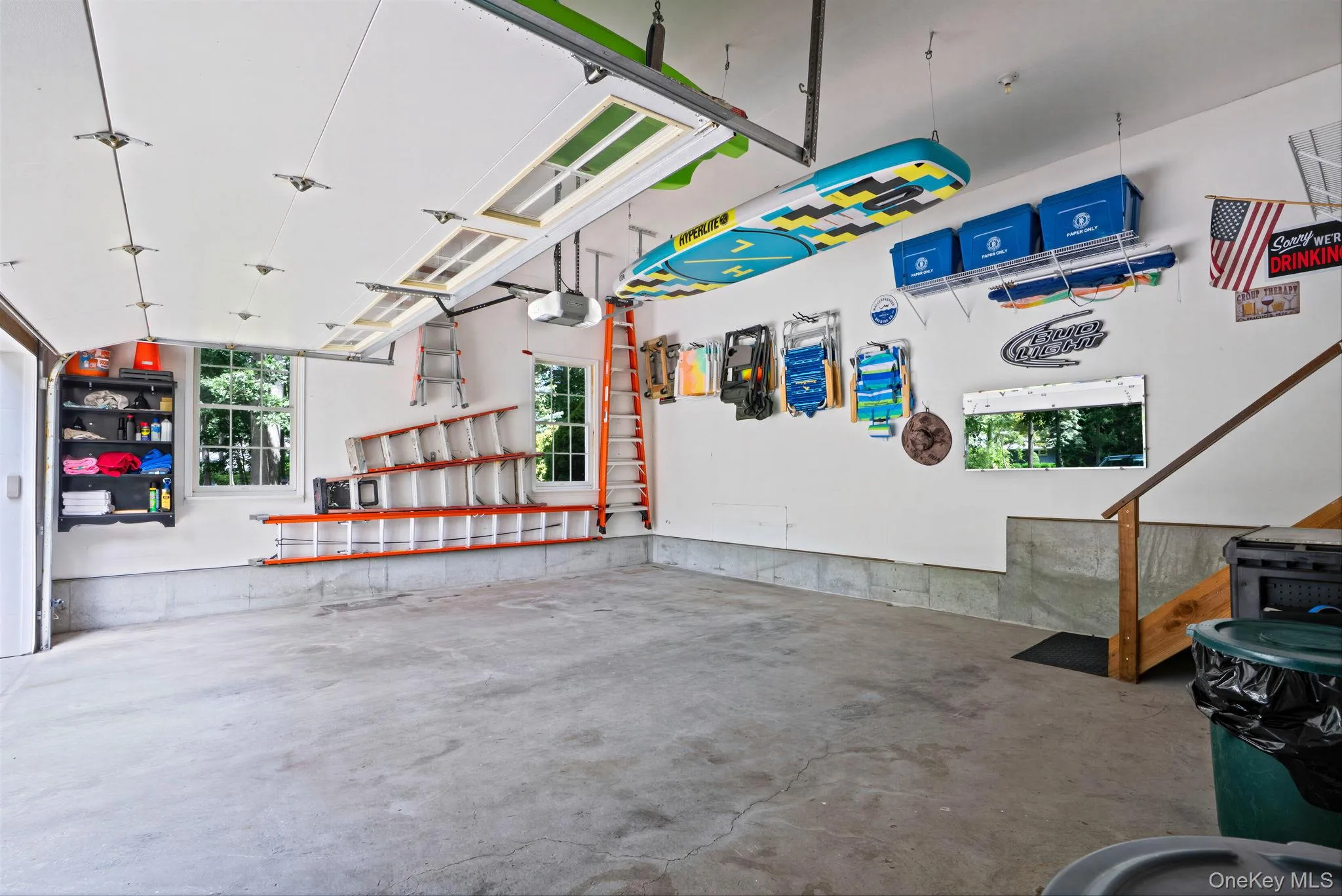 2.5 car garage with 12 foot ceilings and lots of storage space 2.5 car garage with 12 foot ceilings and lots of storage space