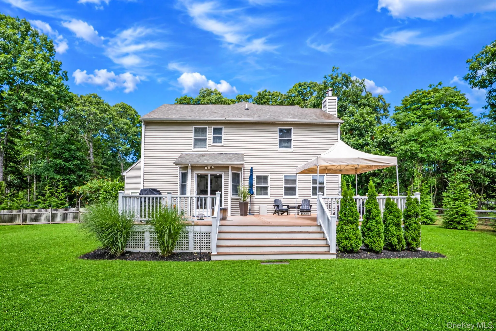View of the back of the home. Located on .81 acre lot. View of the back of the home. Located on .81 acre lot.