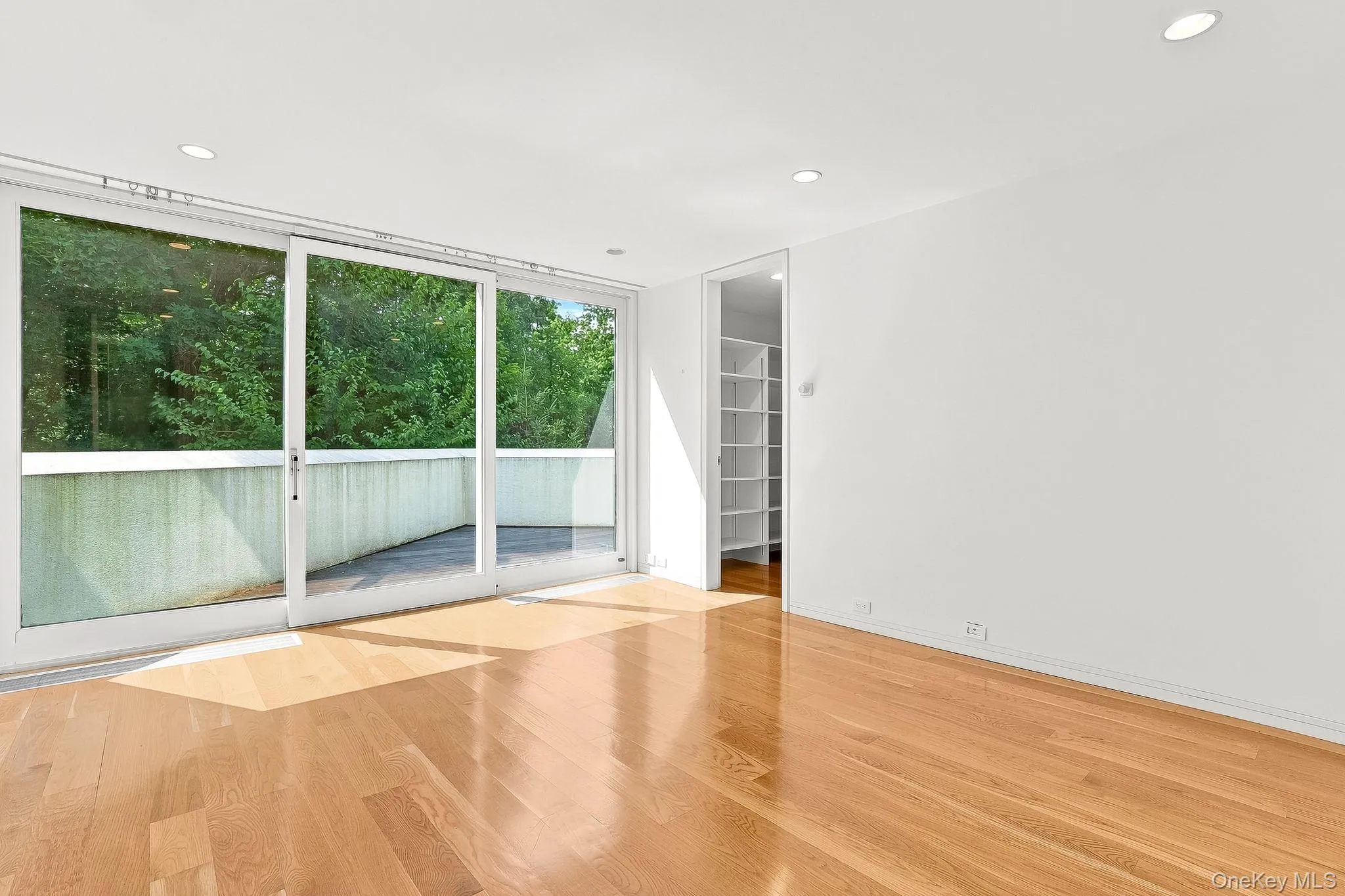 Fifth Bedroom with sliding doors to outside deck Fifth Bedroom with sliding doors to outside deck