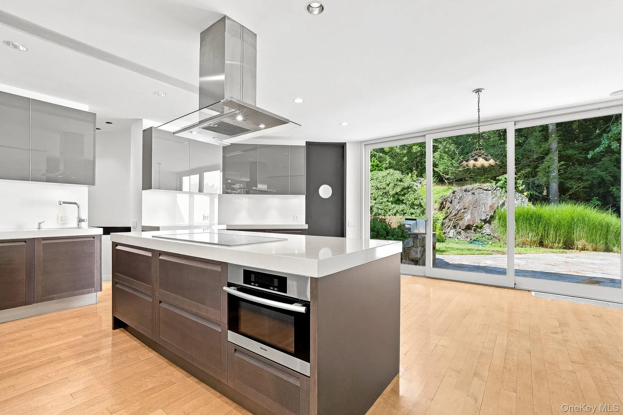 Kitchen island includes stove top and oven. Kitchen island includes stove top and oven.