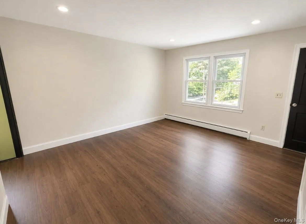Renovated AI photo. New windows, flooring, freshly painted Renovated AI photo. New windows, flooring, freshly painted
