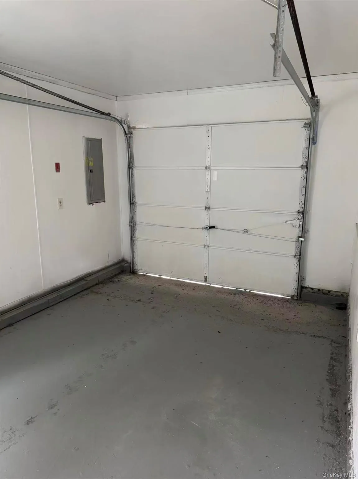 Garage with electric panel Garage with electric panel