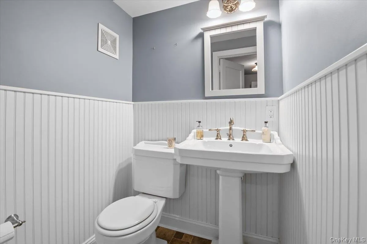 Powder Room in Lower Level Powder Room in Lower Level