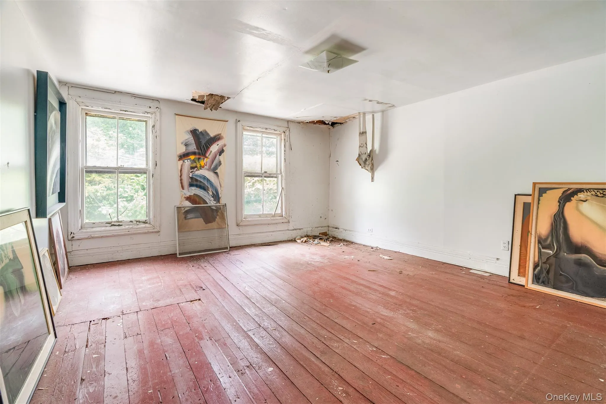 Spare room with hardwood / wood-style floors Spare room with hardwood / wood-style floors