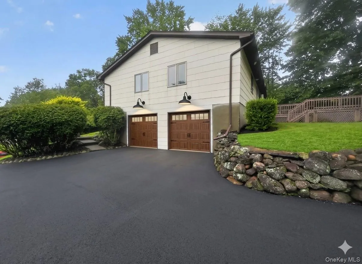 Photo virtually shows what new garage doors can look like Photo virtually shows what new garage doors can look like