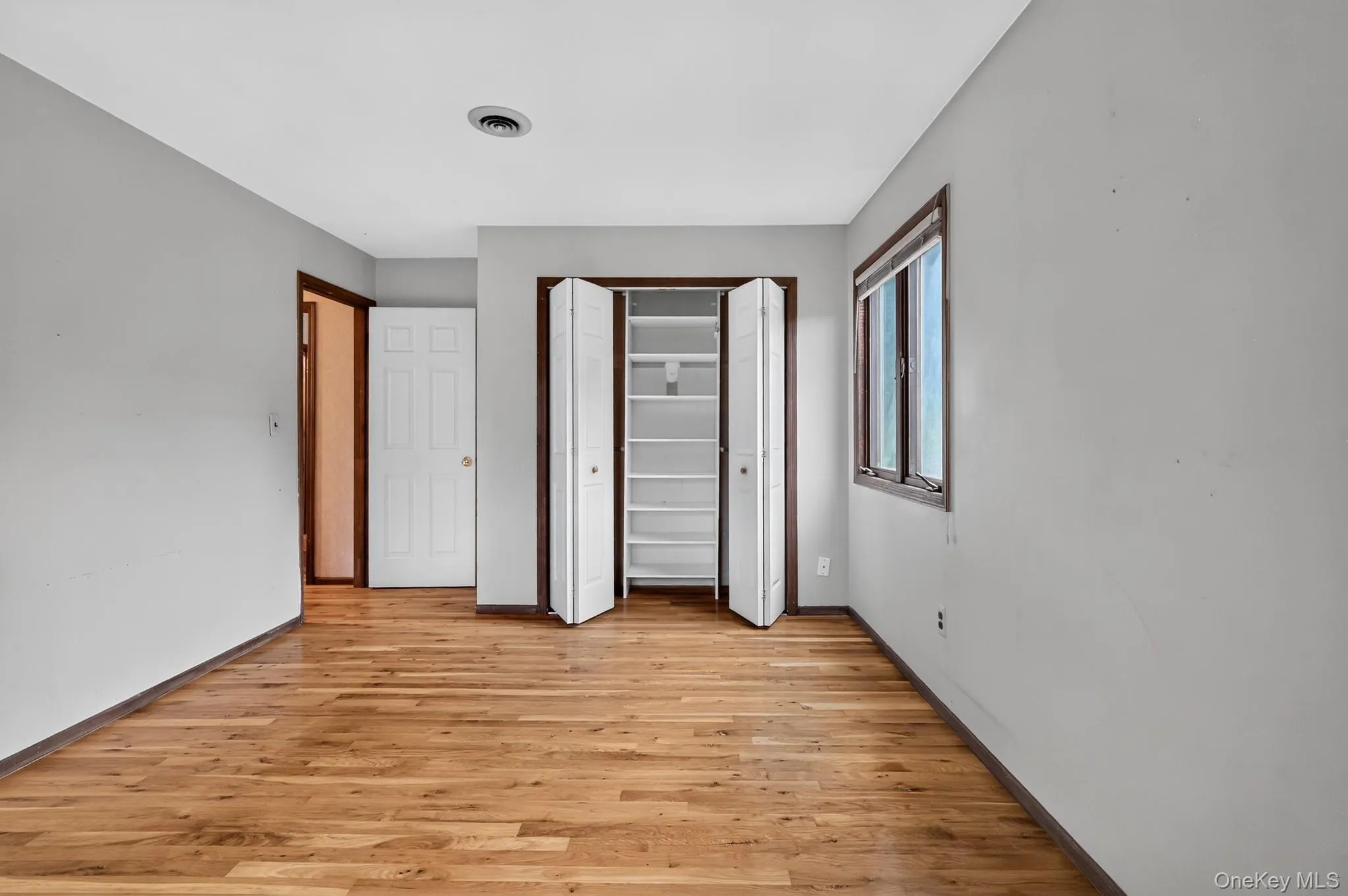 Wood floors with double closet system Wood floors with double closet system