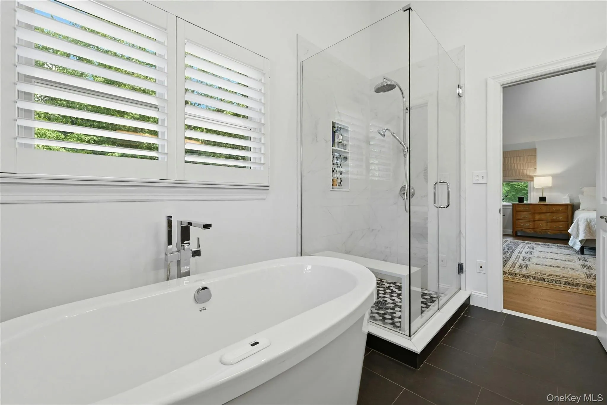 Walk-in shower and soaking tub, custom plantation shutters Walk-in shower and soaking tub, custom plantation shutters