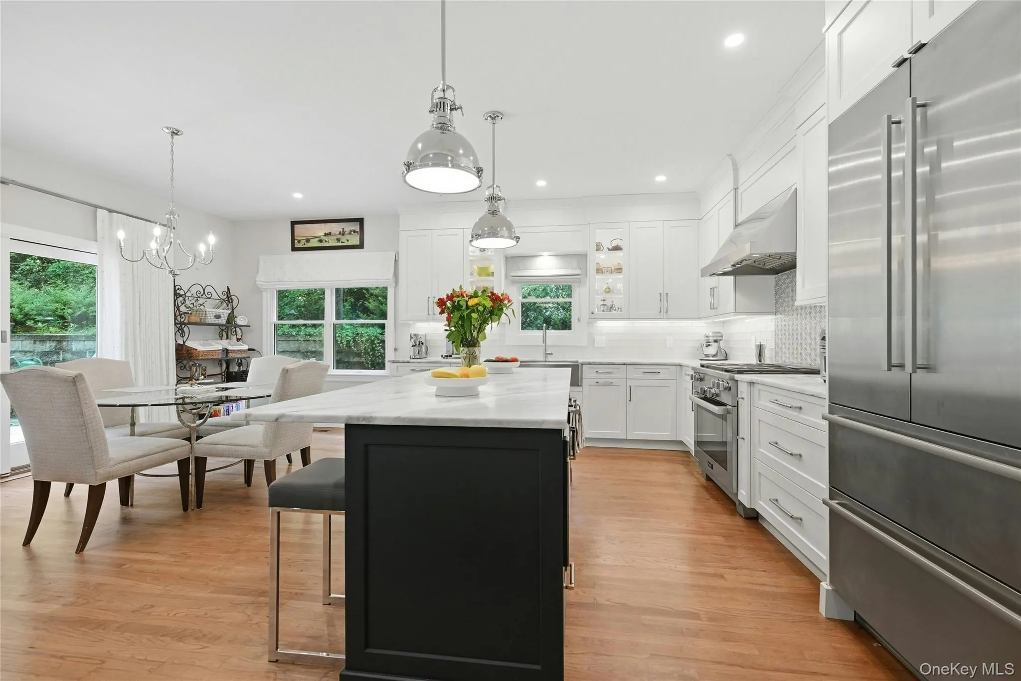 Chef's kitchen with new SS appliances and pendant lighting Chef's kitchen with new SS appliances and pendant lighting