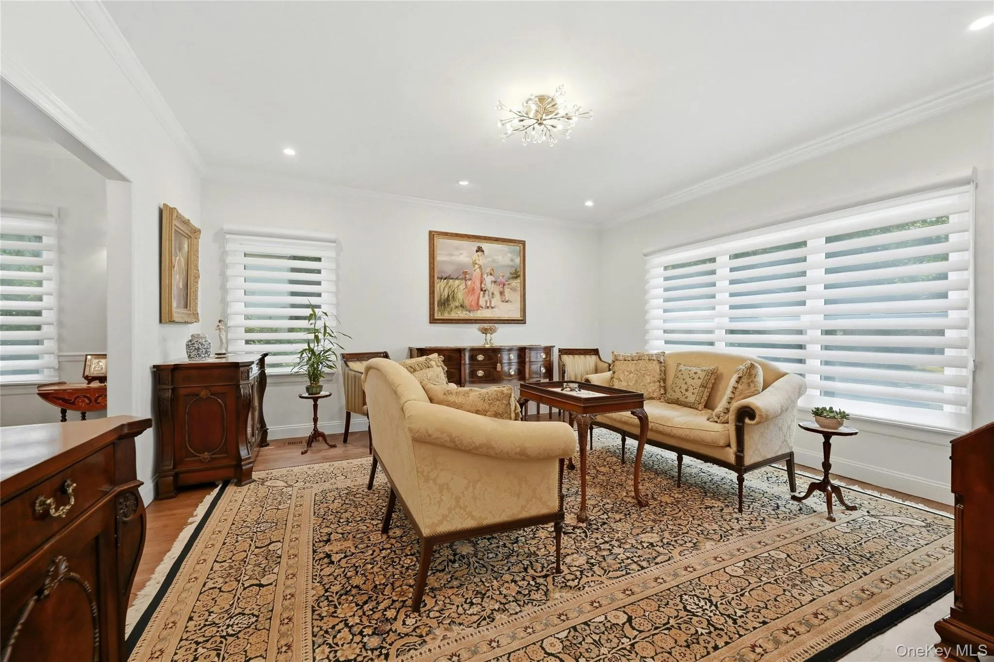 Formal living room with custom blinds Formal living room with custom blinds
