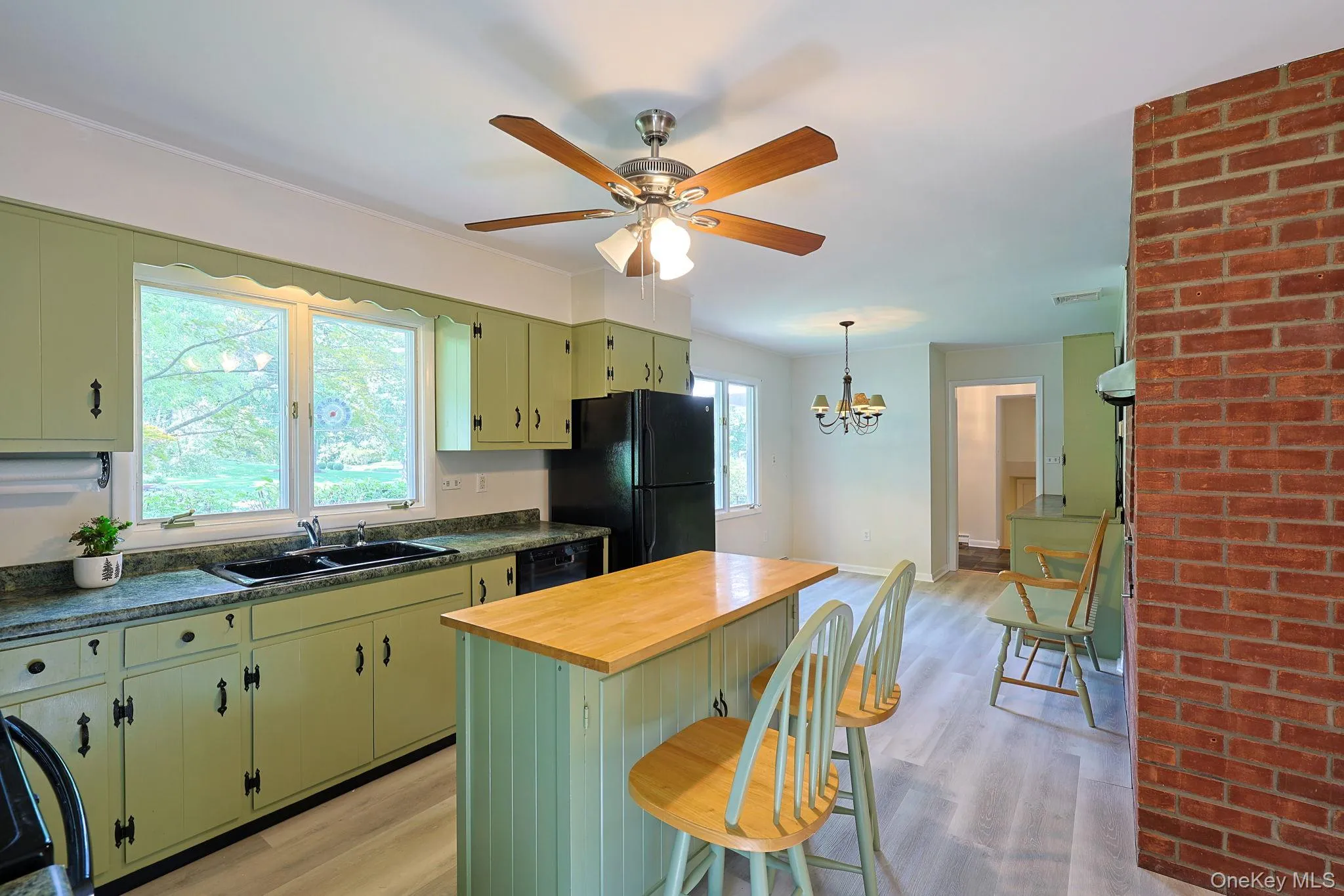 Large eat in kitchen with island. Large eat in kitchen with island.