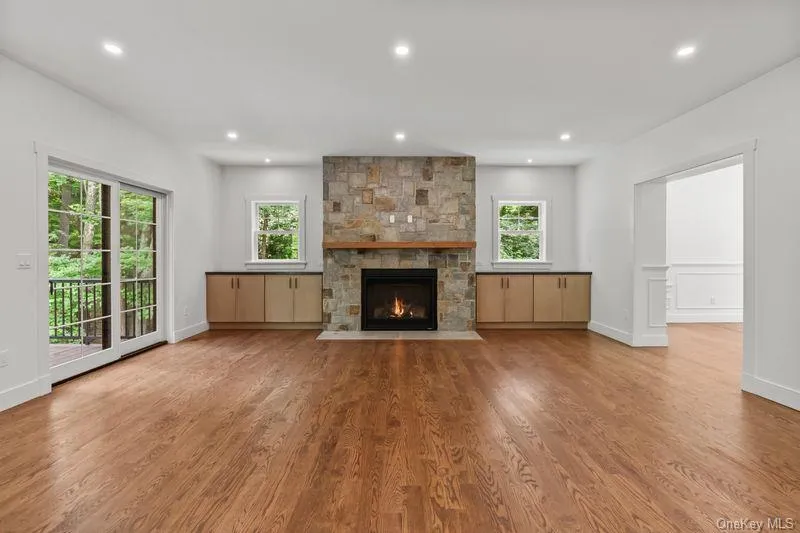 Family room with stone fireplace and built-ins Family room with stone fireplace and built-ins
