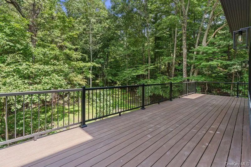 Oversized deck from family room and kitchen Oversized deck from family room and kitchen